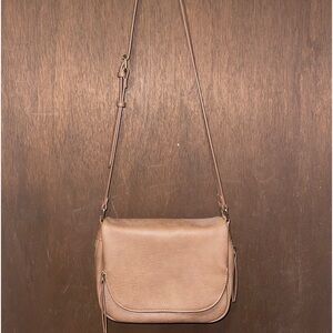 Antik Kraft over the shoulder purse.